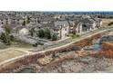 Beautiful condo community with green space, a pond, and walking paths at 9568 W San Juan Cir # 203, Littleton, CO 80128