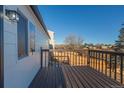 Wooden deck overlooking the backyard and neighborhood at 9318 W 100Th Cir, Broomfield, CO 80021