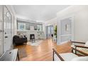 Bright living room with hardwood floors, built-in shelves, and modern decor at 864 Garfield St, Denver, CO 80206