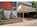 Inviting building entrance with modern architecture and landscaping at 937 Clarkson St # 101, Denver, CO 80218