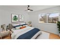 Cozy bedroom with ample natural light, hardwood floors, and stylish decor, perfect for relaxation at 5102 Williams Fork Trl # 201, Boulder, CO 80301