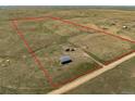 Expansive land parcel outlined in red, featuring a home, outbuilding, and plenty of open space at 13640 County Road 182, Bennett, CO 80102