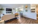 Comfortable living room open to kitchen and dining area at 937 N Clarkson St # 405, Denver, CO 80218