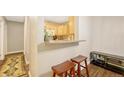 Kitchen with granite countertop and breakfast bar at 2231 S Vaughn Way # 305B, Aurora, CO 80014