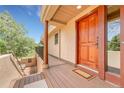 Welcoming front porch and entryway provide a warm invitation with stylish design at 6201 Rain Dance Trl, Littleton, CO 80125