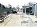 Spacious backyard with a concrete pad that offers ample parking at 1641 S Zenobia St, Denver, CO 80219