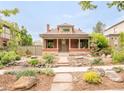 Attractive single-story brick home with a well-maintained front yard at 2845 Quitman St, Denver, CO 80212