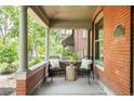 Cozy front porch featuring comfortable seating and classic architectural details at 2845 Quitman St, Denver, CO 80212
