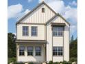 Charming two-story home boasting light siding, a welcoming porch, and stylish modern farmhouse details at 14228 Currant St, Broomfield, CO 80020