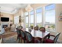 Bright dining room featuring elegant furniture, large windows, and city views at 5455 Landmark Pl # 1116, Greenwood Village, CO 80111