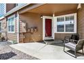Cozy front porch with seating area, perfect for relaxing and enjoying the outdoors at 13271 Holly St # B, Thornton, CO 80241