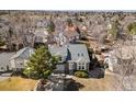 Aerial view of home with mature trees on a large lot in a quiet neighborhood at 3819 S Waco St, Aurora, CO 80013