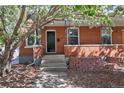 Classic brick facade with front porch and inviting entrance at 3391 W 32Nd Ave, Denver, CO 80211