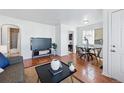 Inviting living and dining space with hardwood floors and ample natural light at 4740 Milwaukee St, Denver, CO 80216