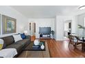 Bright living room with hardwood floors, modern furnishings, and an open layout at 4740 Milwaukee St, Denver, CO 80216