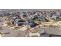 Aerial shot of neighborhood featuring walking trails and common green space at 12659 Stone Creek Ct, Firestone, CO 80504