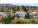 Lovely backyard featuring a patio, trees, and well-maintained lawn, perfect for outdoor living at 3620 Silver Plume Ln, Boulder, CO 80305