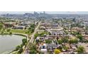 Great view of the home in a vibrant city neighborhood near a lake at 1647 N Osceola St, Denver, CO 80204