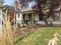 Inviting home with well-maintained front yard landscaping, showcasing a blend of plants and flowers at 3953 Tejon St, Denver, CO 80211