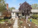 Inviting home featuring a beautifully landscaped front yard, adding to its charm and curb appeal at 3953 Tejon St, Denver, CO 80211