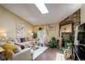 Comfortable living room showcasing natural light, hardwood floors, and stylish decor at 10150 E Virginia Ave # 18-302, Denver, CO 80247