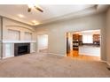 Bright and airy living room with an open floor plan at 26433 E Caley Dr, Aurora, CO 80016