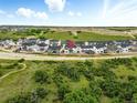 Aerial view of a residential neighborhood with well-maintained homes and green spaces at 3370 Backdrop Ct, Castle Rock, CO 80108