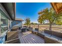 Relaxing outdoor deck area featuring comfortable seating, scenic views, and a cozy ambiance at 6365 W Coal Mine Ave, Littleton, CO 80123