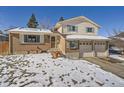 Two-story brick home with attached two-car garage at 9235 Quitman St, Westminster, CO 80031