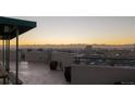 Gorgeous rooftop view with desert landscape and setting sun at 601 W 11Th Ave # 910, Denver, CO 80204