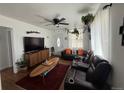 Bright living room with hardwood floors, modern furniture, and natural light at 215 Colorado Blvd, Idaho Springs, CO 80452