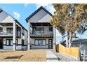 Modern two-story home featuring a balcony and contemporary design at 2317 S Galapago St, Denver, CO 80223