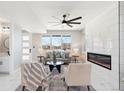 Bright living room with large windows and a modern fireplace at 2317 S Galapago St, Denver, CO 80223
