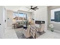 Bright living room with large windows and a modern fireplace at 2317 S Galapago St, Denver, CO 80223