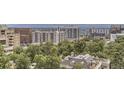 A panoramic city view showcases the area's urban landscape and lush greenery at 740 N Pearl St # 503, Denver, CO 80203