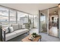 Cozy sun room with comfortable seating and natural light, adjacent to the kitchen at 740 N Pearl St # 503, Denver, CO 80203