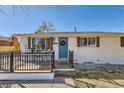 Inviting front porch with seating area, perfect for relaxing and enjoying the neighborhood views at 8985 Lander St, Westminster, CO 80031