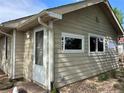 Exterior shot of home showcasing the house number, new siding, and an inviting front entrance at 437 6Th St, Frederick, CO 80530
