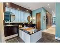 Stunning primary bathroom features a soaking tub, dual sinks, and plenty of storage at 235 Eudora St, Denver, CO 80220
