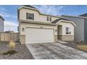 Charming home with stone accents, two-car garage, well-maintained lawn, and inviting front entrance at 13362 Amber Sky St, Parker, CO 80134