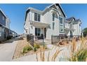 Beautiful two-story home with modern architectural details, tasteful landscaping, and a welcoming walkway at 1998 S Poplar Ct, Denver, CO 80224