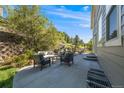 Outdoor patio with comfortable seating, perfect for entertaining or relaxing at 7329 Arco Iris Ln, Castle Pines, CO 80108