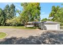 Lovely single-Gathering home with mature trees and attached two-car garage at 8813 Baseline Rd, Lafayette, CO 80026