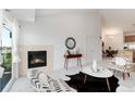 Inviting living room boasting a fireplace, stylish seating, and easy access to other living spaces at 804 Summer Hawk Dr # 7301, Longmont, CO 80504