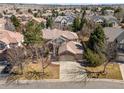 Expansive aerial view of a neighborhood showcasing the home's setting and surrounding landscape at 21548 E Ottawa Cir, Aurora, CO 80016