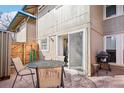 Outdoor patio perfect for dining or grilling with a table and grill available for use at 5959 S Willow Way, Greenwood Village, CO 80111