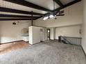 Spacious living room with high vaulted ceilings and exposed wood beams at 1943 Meadow Dr # B2, Longmont, CO 80501