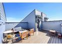 Spacious rooftop deck with ample seating and string lights, great for outdoor gatherings and enjoying city views at 5738 N Vivian St, Arvada, CO 80002