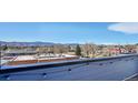 Beautiful view from the roof top deck overlooks the city with a mountain landscape at 5738 N Vivian St, Arvada, CO 80002