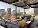 Spacious rooftop terrace with city views and fire pit at 1901 Wazee St # 1401, Denver, CO 80202